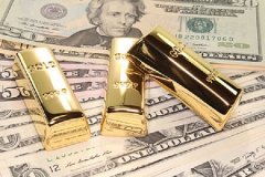 国际金价创下近十个月新低 刺激国内黄金消费